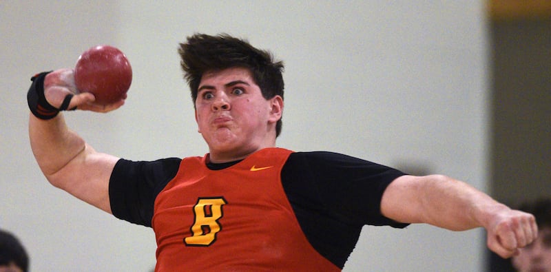 Batavia’s Gavin Pecor throws the shot put during the DuKane Conference indoor track meet at Batavia High School on Friday, March 21, 2025.