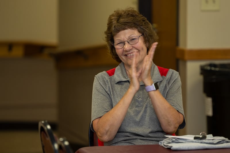 Jessica Kreiser applauds at the 16th annual Utica Fireside White Sox Club donation ceremony on Monday, Aug 18, 2025 at the Community Building in Utica.