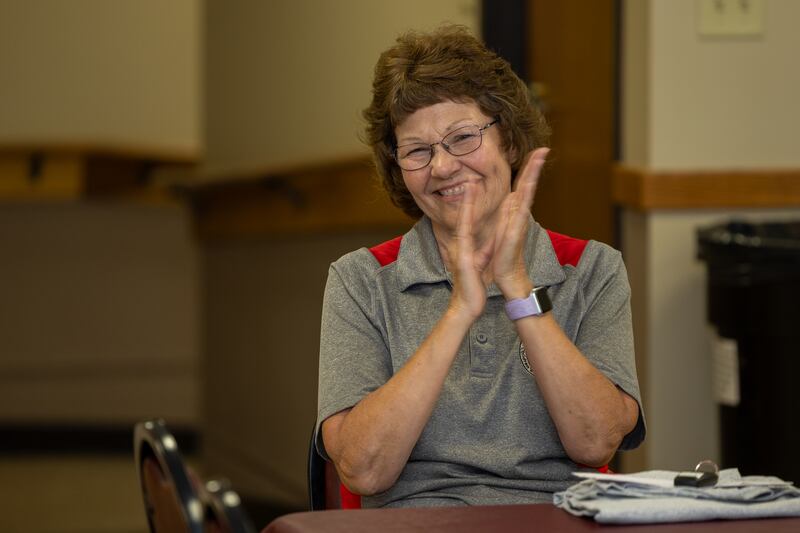 Jessica Kreiser applauds at the 16th annual Utica Fireside White Sox Club donation ceremony on Monday, Aug 18, 2025 at the Community Building in Utica.