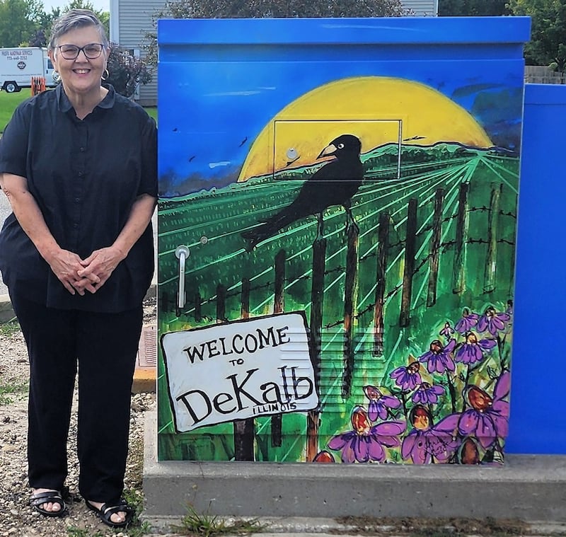 The “Welcome to DeKalb, Illinois” DeKalb High School utility box, painted by Christine Perkovich