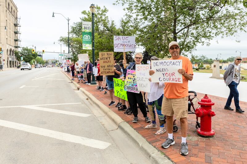 Attendees line Jefferson Street in Downtown Joliet during the Good Trouble Lives On event on July 17, 2025.