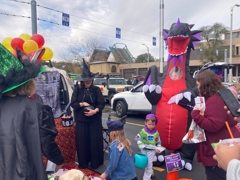 Trick-or-treaters play "the floor is made of lava" at the trunk of the Will County Children's Advocacy Center.
Saturday, Oct. 25, 2025.