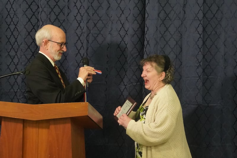 Sue Croft received the Robert Moehle Personal Achievement award at the Village of Progress Annual Banquet on Wednesday, Oct. 22, 2025 in Oregon. At left is Master of Ceremonies Tom Wadsworth.