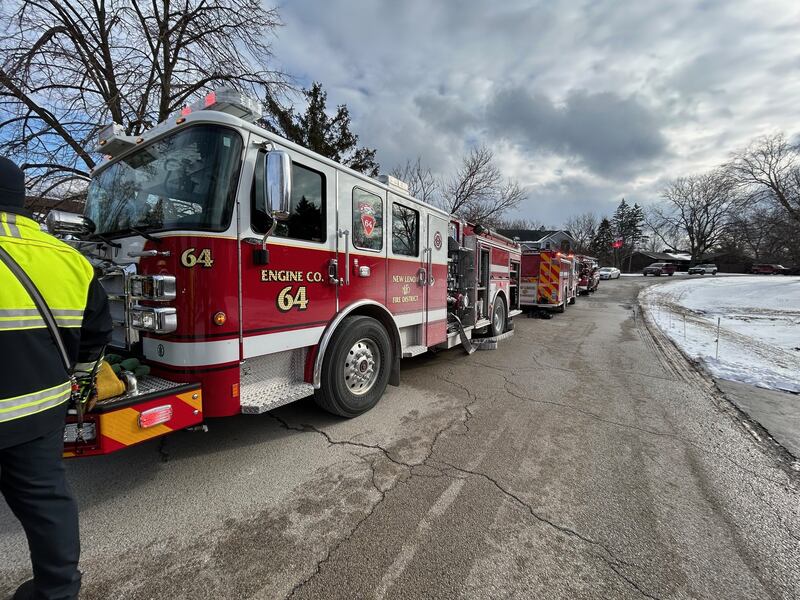 New Lenox Fire Protection District vehicles line the street in the 13200 block of West Timothy Lane in Mokena on Wednesday, Jan. 21, 2026.