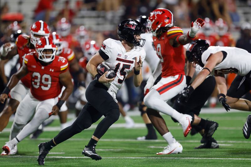 Northern Illinois quarterback Josh Holst (15) in action during an NCAA football game against Maryland on Friday, Sept. 5, 2025, in College Park, Md. Maryland won 20-9. (AP Photo/Mike Buscher)