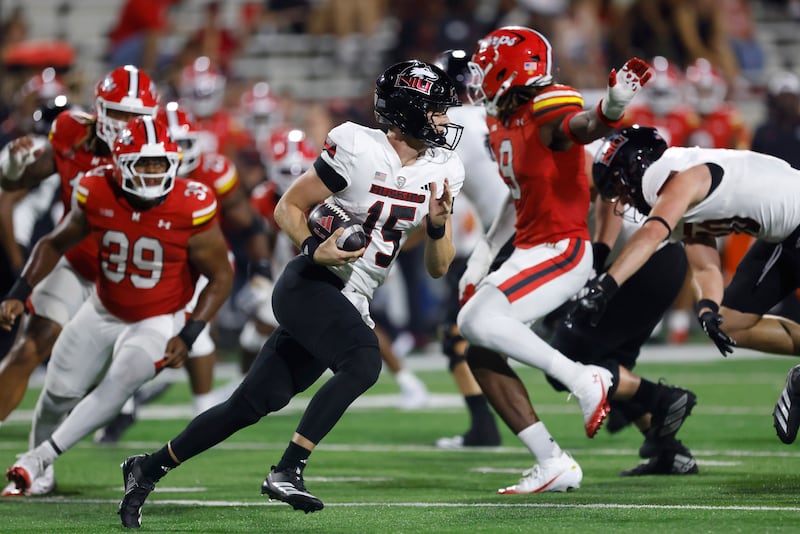 Northern Illinois quarterback Josh Holst (15) in action during an NCAA football game against Maryland on Friday, Sept. 5, 2025, in College Park, Md. Maryland won 20-9. (AP Photo/Mike Buscher)