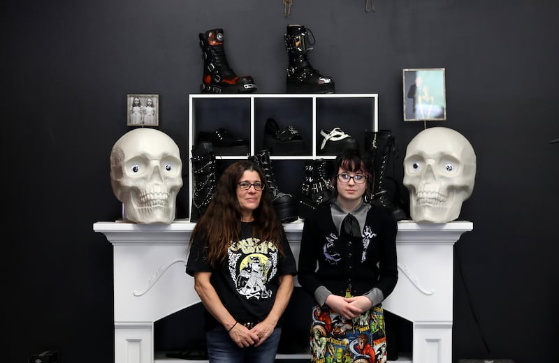 Megan Miller and her daughter, Lila McGovern, inside the Hideous Heart on Friday, Aug. 1, 2025, on Elm Street in McHenry. The shop that sells alternative clothing and accessories, opened in March 2024 and recently moved to a new larger location, nearly quadrupling its floor space.
