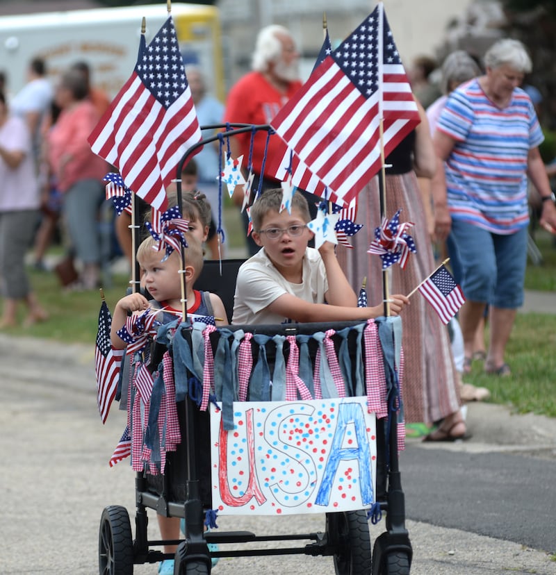 The Wehmhoefer kids ride in the Let Freedom Ring Kiddie Parade on Saturday, July 5, 2025.