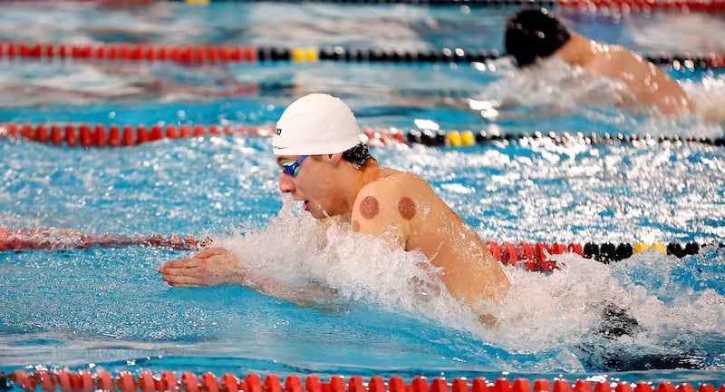 Cary-Grove Co-op's Kasparas Venslauskas, competes in the Boys 200 Yard Medley Relay during the IHSA Barrington Sectional Saturday, Feb. 22, 2025 in Barrington.
