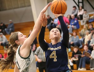 Photos: Marquette falls to Midland in girls basketball