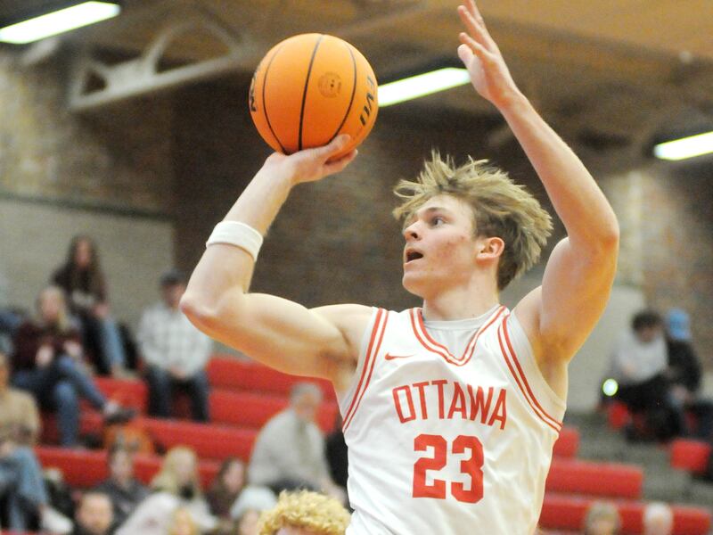 Ottawa Owen Sanders (23) shoots past overtop Morris defenders Friday, Dec. 12, 2025, at Kingman Gym.