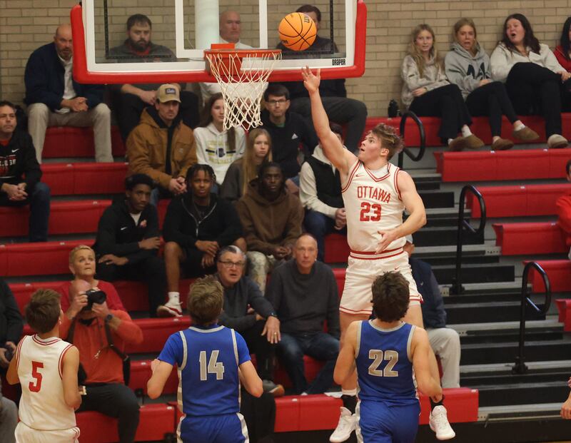 Ottawa's Owen Sanders runs in for a layup against Princeton during the Dean Riley Shootin' The Rock Thanksgiving Tournament on Monday Nov. 24, 2025 in Kingman Gymnasium at Ottawa High School.
