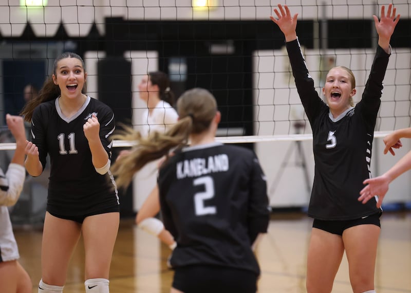 Kaneland players celebrate a point during their match against Sycamore Tuesday, Sept. 30, 2025, at Kaneland High School in Maple Park.