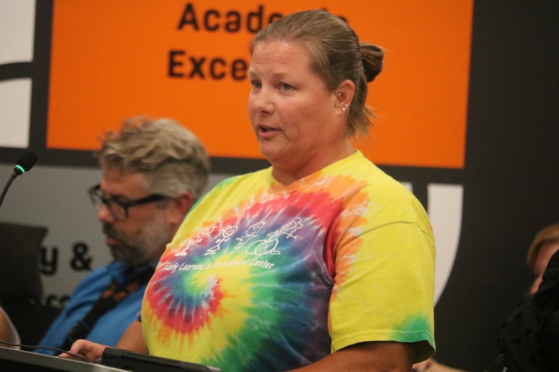 ELDC teacher Katie Hueber speaks Aug. 5, 2025, at a DeKalb School District 428 Board meeting.