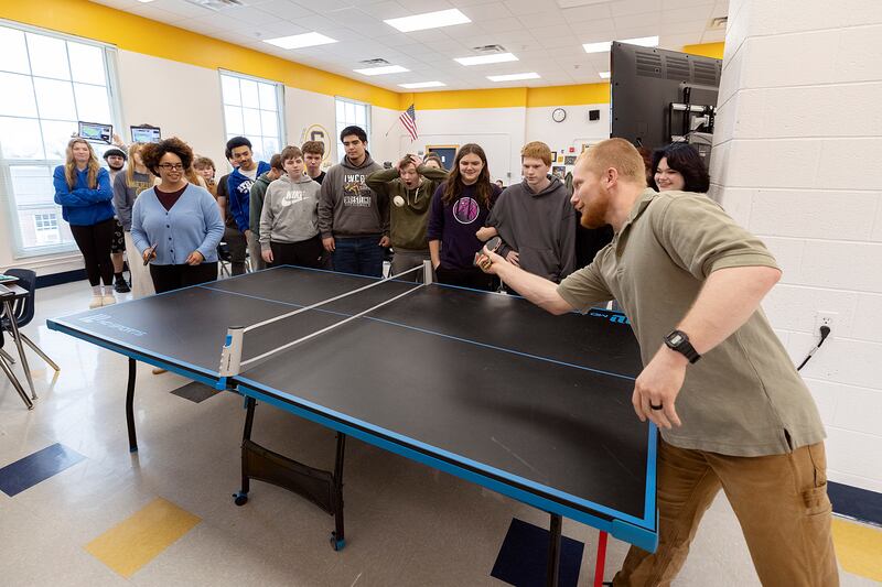 Zhane’ (left) and Nolan Baker play a bit of ping pong at the end of class Thursday, March 27, 2025, at Sterling High School. The husband and wife teachers started a ping pong club at the school.