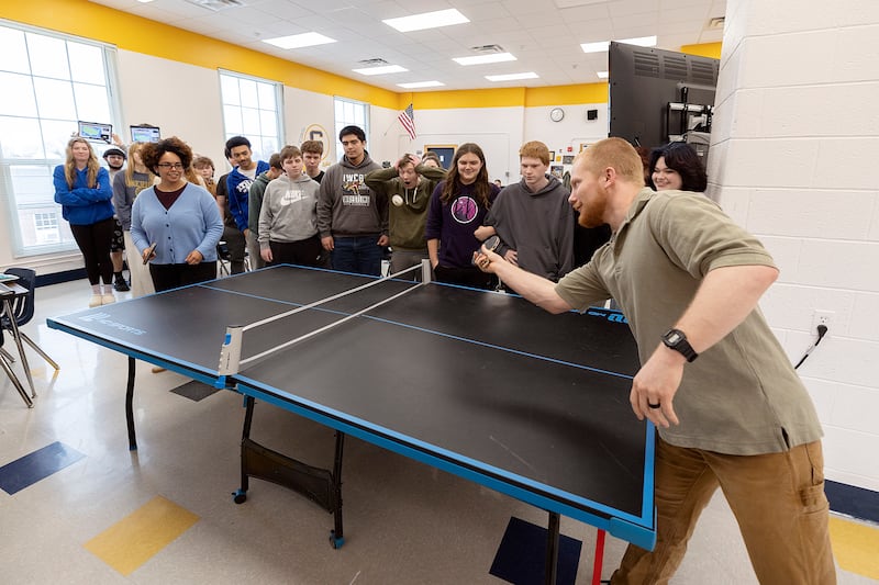 Zhane’ (left) and Nolan Baker play a bit of ping pong at the end of class Thursday, March 27, 2025, at Sterling High School. The husband and wife teachers started a ping pong club at the school.