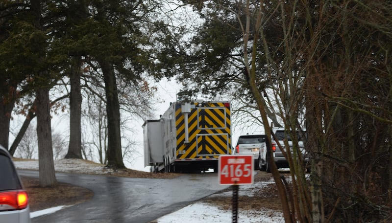 Several law enforcement vehicles, including the Ogle County Sheriff Department's Mobile Command Center, were at a home at 4165 E. Illinois 64, about three miles east of Oregon, on Friday, March 7, 2025.