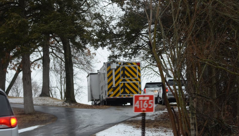 Several law enforcement vehicles, including the Ogle County Sheriff Department's Mobile Command Center, were at a home at 4165 E. Illinois 64, about three miles east of Oregon, on Friday, March 7, 2025.