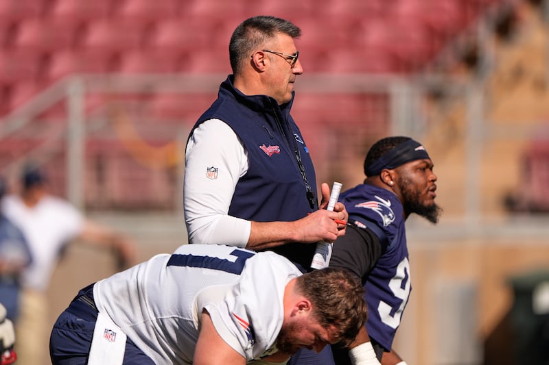 New England Patriots head coach Mike Vrabel watches practice for the Super Bowl 60 NFL football game against the Seattle Seahawks, Friday, Feb. 6, 2026, in Stanford, Calif. (AP Photo/Charlie Riedel)