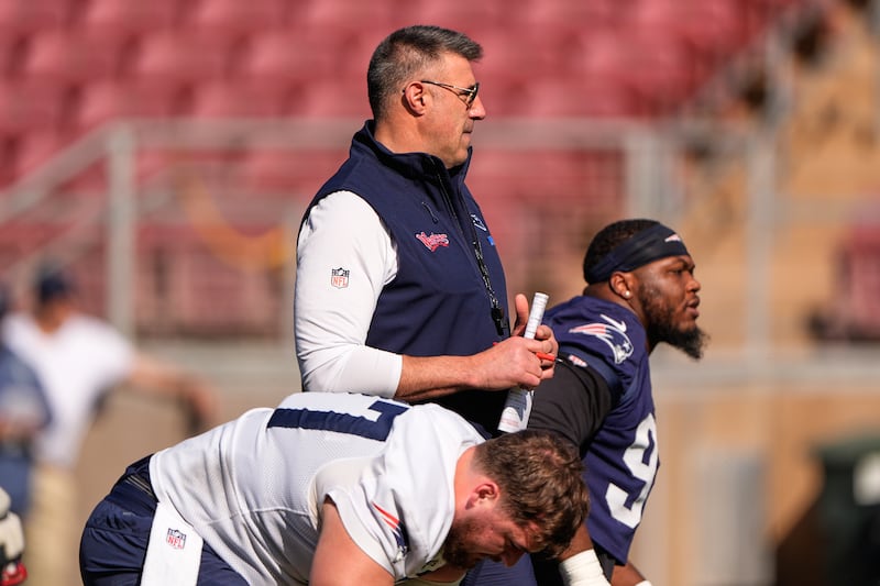 New England Patriots head coach Mike Vrabel watches practice for the Super Bowl 60 NFL football game against the Seattle Seahawks, Friday, Feb. 6, 2026, in Stanford, Calif. (AP Photo/Charlie Riedel)