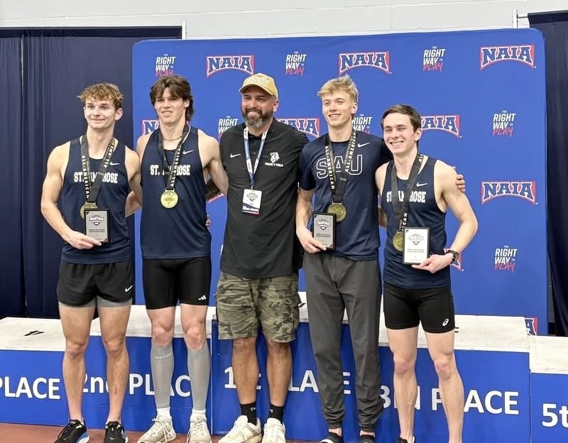 Elijah House (second from left) and his St. Ambrose University 4x800 relay mates Tyler Moody, Chris Miserendino and Dylan Grandon and House earned NAIA All-American honors by placing fourth in the indoor nationals at Gainesville, Fla.