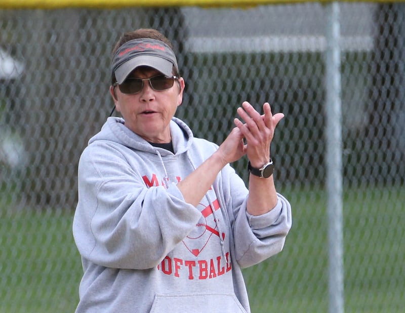 Henry-Senachwine head softball coach Lori Stenstrom cheers on her team while playing Flanagan-Cornell/Woodland on Monday, May 8, 2023 in Henry.