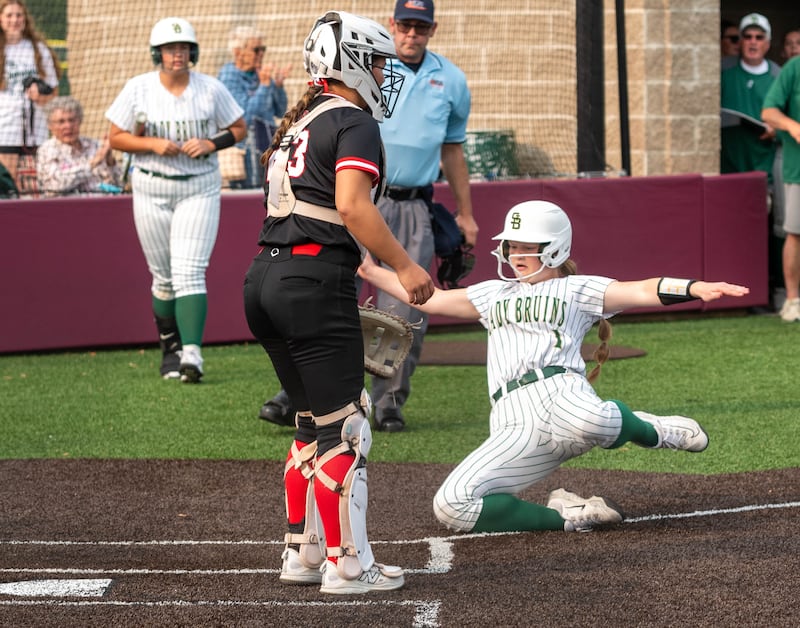 St. Bede courtesy runner Sadie Leffelman scores a first-inning run in Friday's sectional championship in Chillicothe. The Bruins saw their season end with a 4-1 loss to Brimfield.