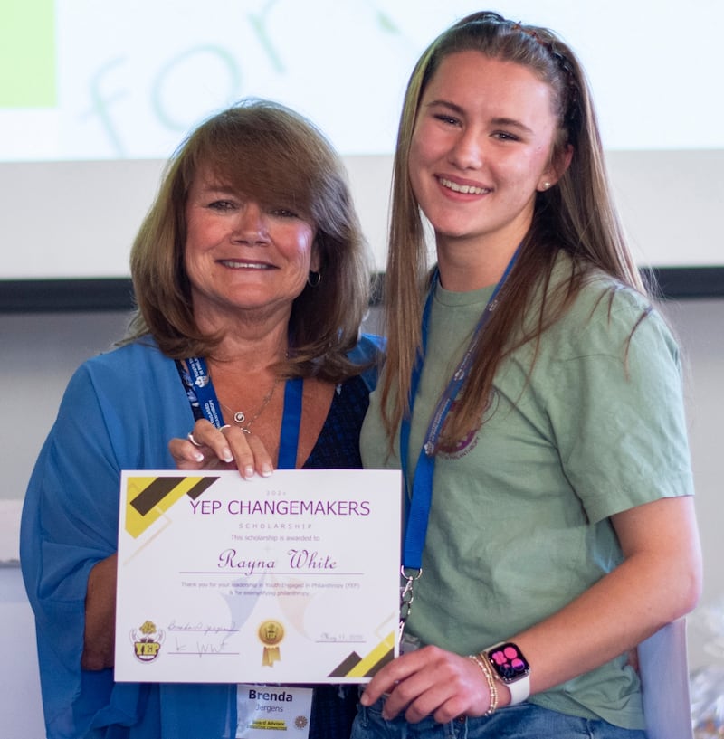 DeKalb County Community Foundation board member Brenda Jergens presenting the 2026 YEP Changemakers Scholarship to Rayna White