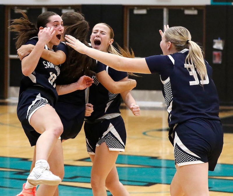 St. Viator's Allison Wade (left to right) St. Viator's Gabriella Scaravalle, Kalin McCrea and Ava Garcia during the IHSA Class 3A Woodstock North Supersectional girls basketball game on Monday, March 2, 2026, at Woodstock North High School.