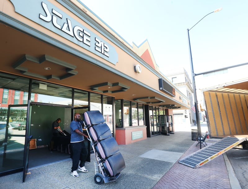Strov Brown with Two Men In A Truck, moves a section of seats out of Stage 212 on Monday, Sept. 8, 2025 downtown La Salle. The seats will be moved to Sharon Healthcare Woods in Peoria.