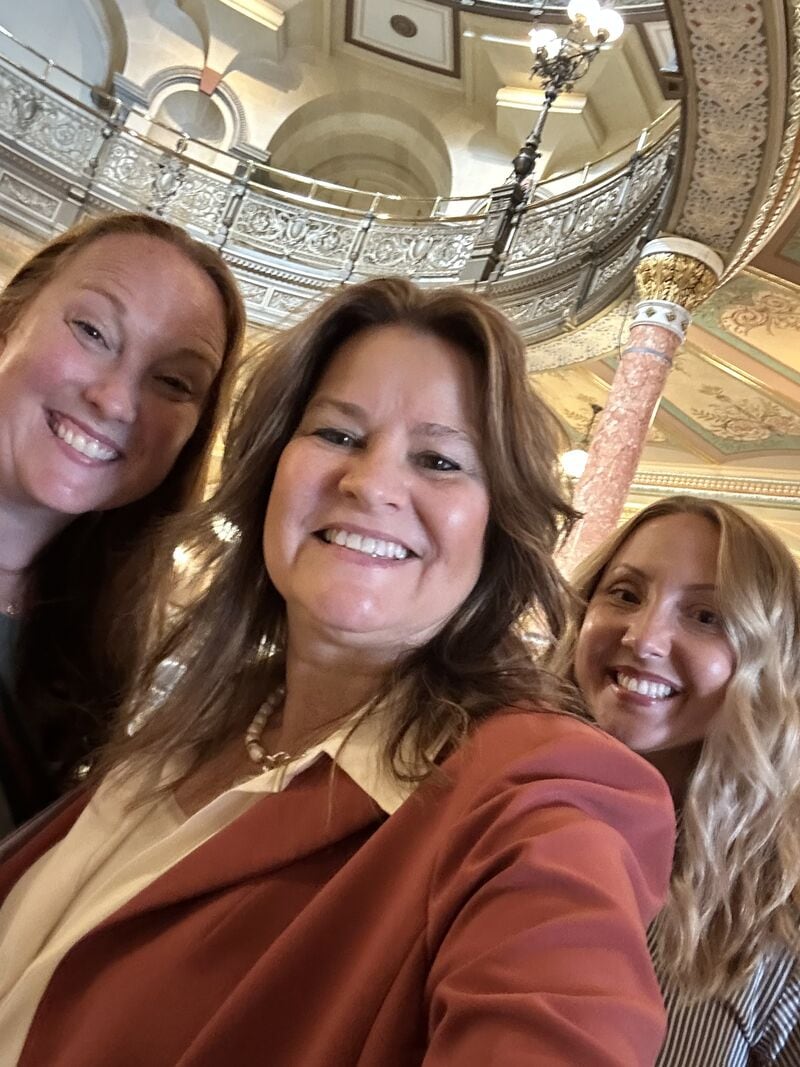 DeKalb County Economic Development Corp. Executive Director Melissa Amedeo (middle) poses with fellow DeKalb County nominees Hannah Davekos and Caitlin Benes during the Women to Watch conference on April 22, 2026, in Springfield.