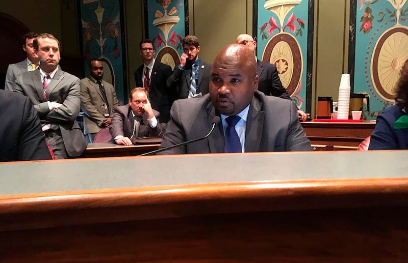 Sen. Elgie Sims, D-Chicago, discusses the proposed budget in a committee hearing in this Wednesday, May 30, 2018 photo, in Springfield, Ill. Sims on Tuesday, Oct. 26, 2021, won Illinois Senate approval of legislation to repeal a 1995 law requiring that a parent or guardian be notified at least 48 hours before a girl younger than 18 undergoes an abortion. The bill now moves to the House with two days left in the Illinois General Assembly's fall session. (AP Photo/John O'Connor)