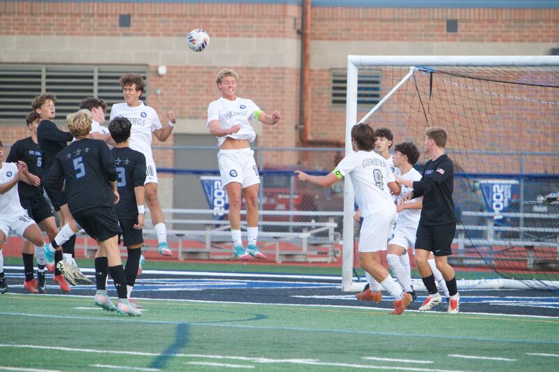 Geneva's Ben Murphy looks to head the ball in the goal against St. Charles North on Tuesday, Sept. 9,2025 in St. Charles.