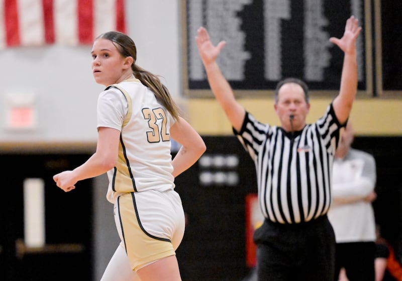 Sycamore's Quinn Carrier (32) looks back after sinking a 3 point basket against Winnebago during a game in Sycamore on Wednesday, Jan. 21, 2026.
