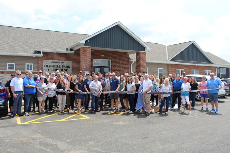 The DeKalb, Genoa Area, and Sycamore chambers of commerce celebrating Communities by Grainger’s Old Mill Park Clubhouse opening