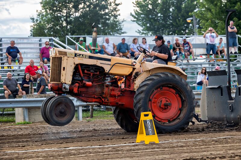 Colton Estock’s Case 830’s wheels dig into the track Thursday, July 24, 2025, at the Lee County Fair.