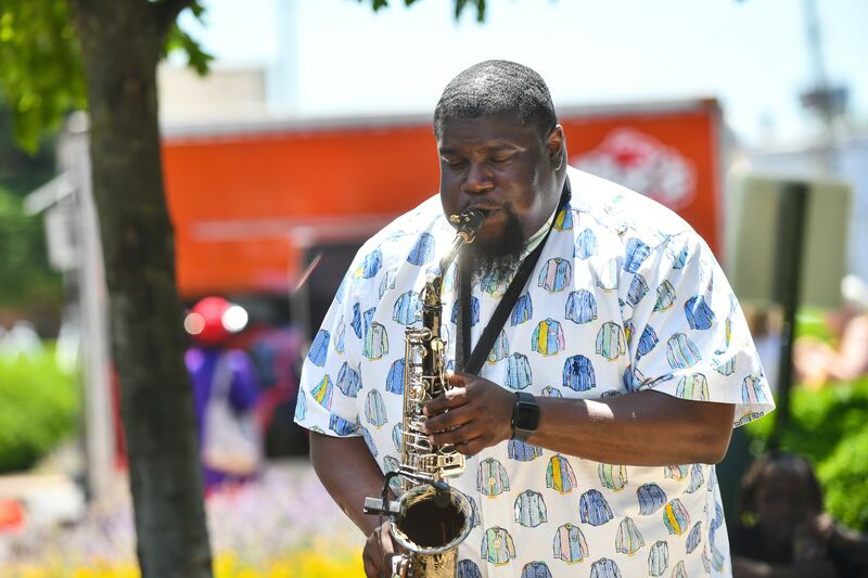 LeVar Kellogg solos on the saxophone while performing with Three’s a Crowd during a 2024 Sandwiches with a Side of Jam event, hosted by Downtown Kankakee and the Kankakee Public Library at the Harold & Jean Miner Festival Square in downtown Kankakee.
