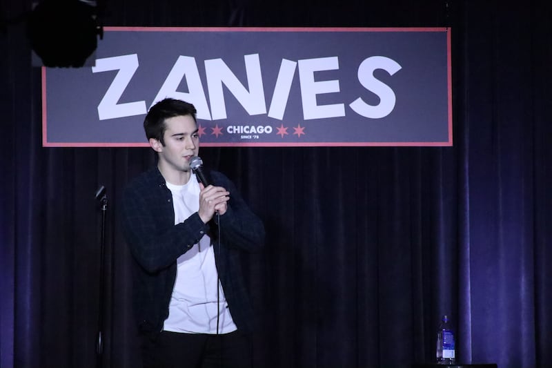 Comedian Des Mulrooney performs at a past show.