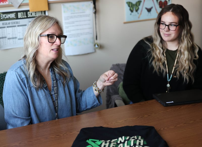 Maryellen Spicer (left) and Mallory Wolf, social workers at Sycamore High School, talk Wednesday, April 16, 2025, at the school about the Student-Athlete Support Coalition that they are a part of that gives support to student athletes at the school.