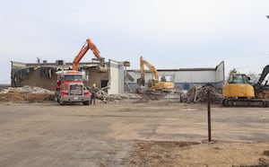 Photos: Bill Walsh Coronet dealer demolished in Peru