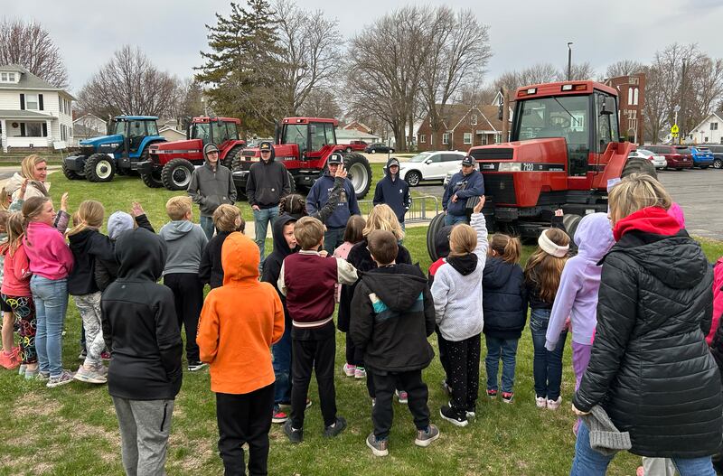 Five Forreston High School FFA members brought their tractors to Forreston Grade School on Thursday, April 17, 2025. Kids could climb up the cab and learn all about the machines.