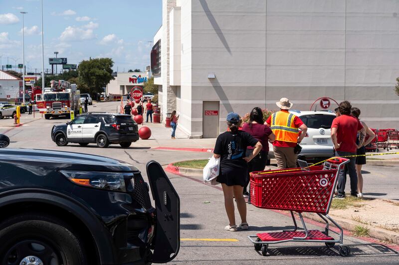 Law enforcement investigates a shooting at Target off Research Boulevard, near Ohlen Road in Austin, Texas, Monday, Aug. 11, 2025.