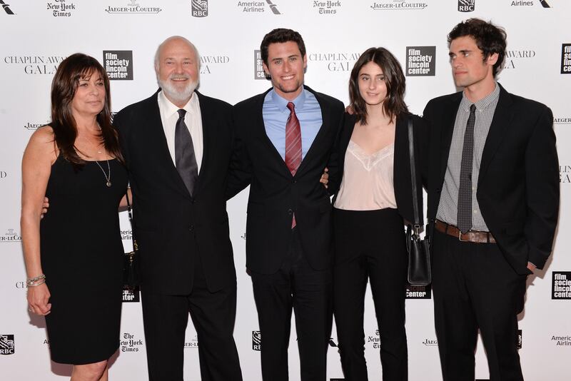 FILE - Honoree Rob Reiner, second left, poses with his wife Michele, left, and children Jake, center, Romy, and Nick at the 41st annual Chaplin Award Gala at Avery Fisher Hall, April 28, 2014, in New York. (Photo by Evan Agostini/Invision/AP, File)