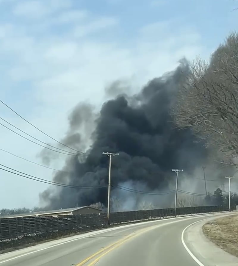 A brush fire in Holiday Hills on Wednesday, March 25, 2026, left a plume of black smoke in the air that could be seen for miles.