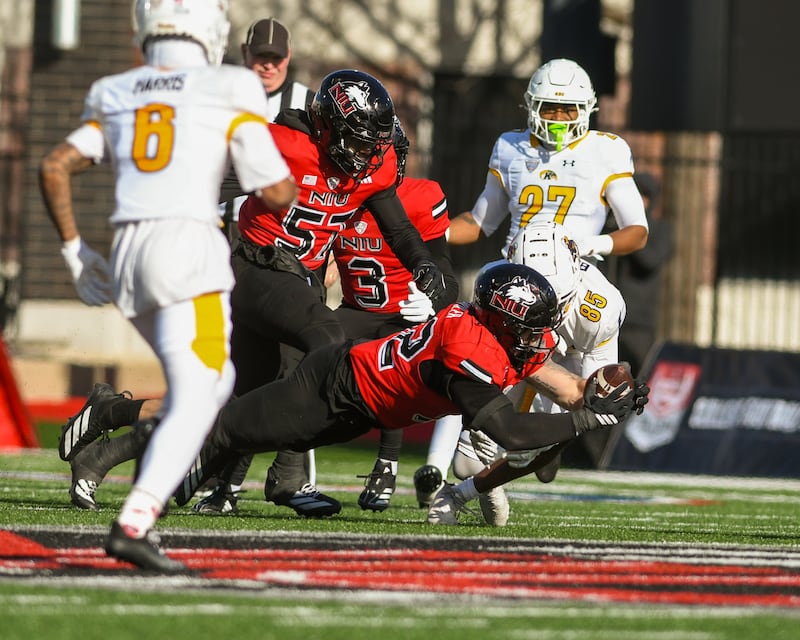 Northern Illinois University's linebacker Quinn Urwiler (32) intercepts the ball during the game on Friday Nov. 28, 2025, while taking on Kent State held at Huskie Stadium in DeKalb.