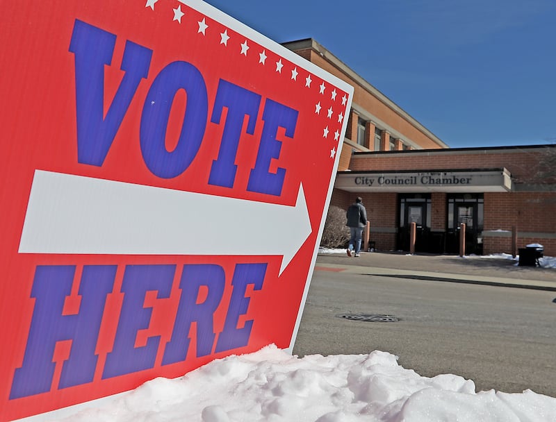 A voter walks into the McHenry City Hall on Tuesday, March, 17, 2026, to cast a ballot in the Illinois primary election.