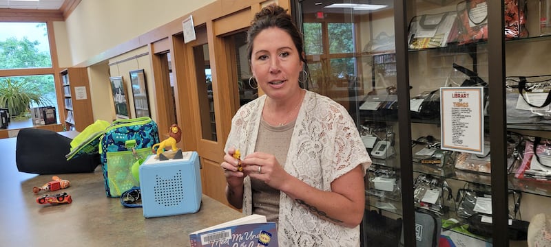 Jeannine Otto/Sauk Valley Newspapers
Amy Runkle, director of the Winifred Knox Memorial Library, shows off a digital story reader, one of the items in the "Library of Things," a collection of items that patrons can check out and use. The Winifred Knox Memorial Library in Franklin Grove offers all the traditional library books and services. But the library, which opened in 2007 and replaced an older library down the street, also serves as a community center, offering events and activities to bring the community into the library and together.