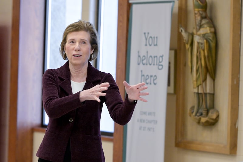 Illinois Supreme Court Justice Elizabeth Rochford speaks to 7th grade students at St Patrick Catholic School on Thursday, Dec 4, 2025 in St. Charles.