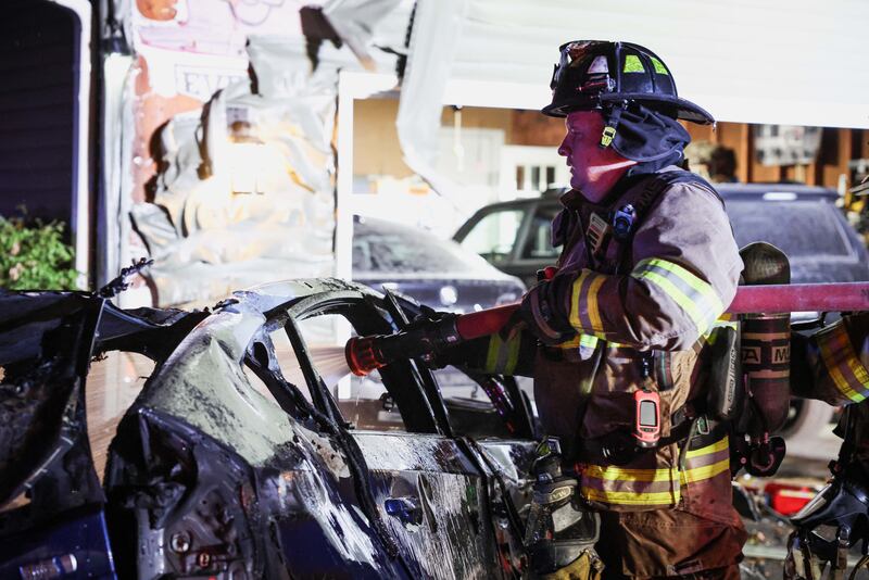 The Marengo Fire & Rescue Districts put out a car and house fire from a fatal crash at the 22800 block of River Road near Marengo on Oct. 13, 2025.