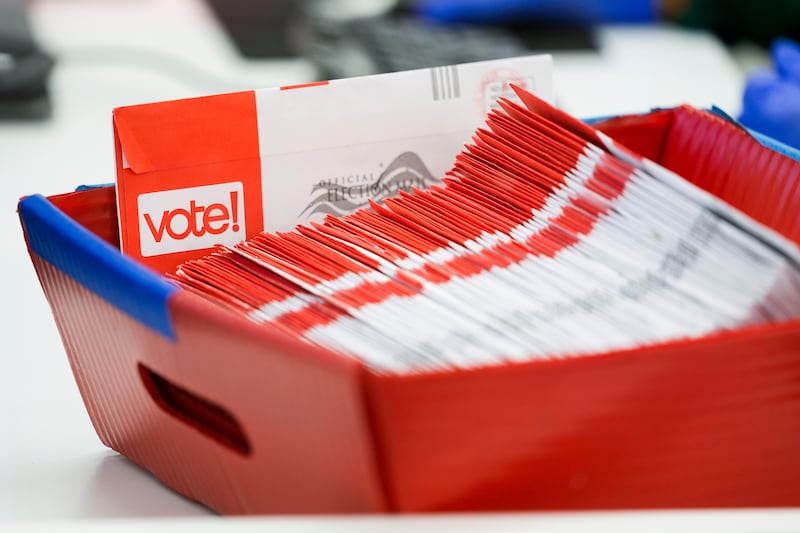 FILE - A tray of mail-in ballots is seen at King County Elections headquarters on Election Day, Nov. 5, 2024, in Renton, Wash. (AP Photo/Lindsey Wasson, File)